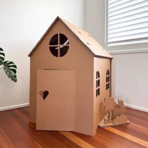 Front view of the Kraft-Me cardboard cubby house with heart-shaped door detail